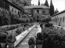 Alhambra, Granada. june 1999. Rolleiflex SL35 + Distagon 25mm (?), Ilford Delta 100. Normally I despise having people in my pics (kinda like in RealLife[tm]), but in this case the slouchy posture of the guy conveys the tranquility of the gardens somewhat.