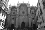 Cathedral, Granada, june 1999. Rolleiflex SL35 + Distagon 25mm (?), Ilford Delta 100. Really bad light here. What's that dork stretching his arms out for? Or is it a dorkette? Must be a tourist yelling, 