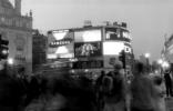 London, june 2001. Rolleiflex SL35 + Distagon 35mm, Ilford Delta 100. The hustle and bustle of Picadilly Circus on a Saturday night. This caught me off guard, as I didn't take a tripod along. I improvised by setting the camera up on a utilities box on the street corner. Since it was right in front of a wall, I couldn't see the damn viewfinder (my kingdom for a waistlever finder!), so I sort of pointed the camera where I thought the action would be, and snapped away. This was one of the better (and longer) exposures. Note the doubledecker bus emerging like a blurred wall from the side street at centre left.